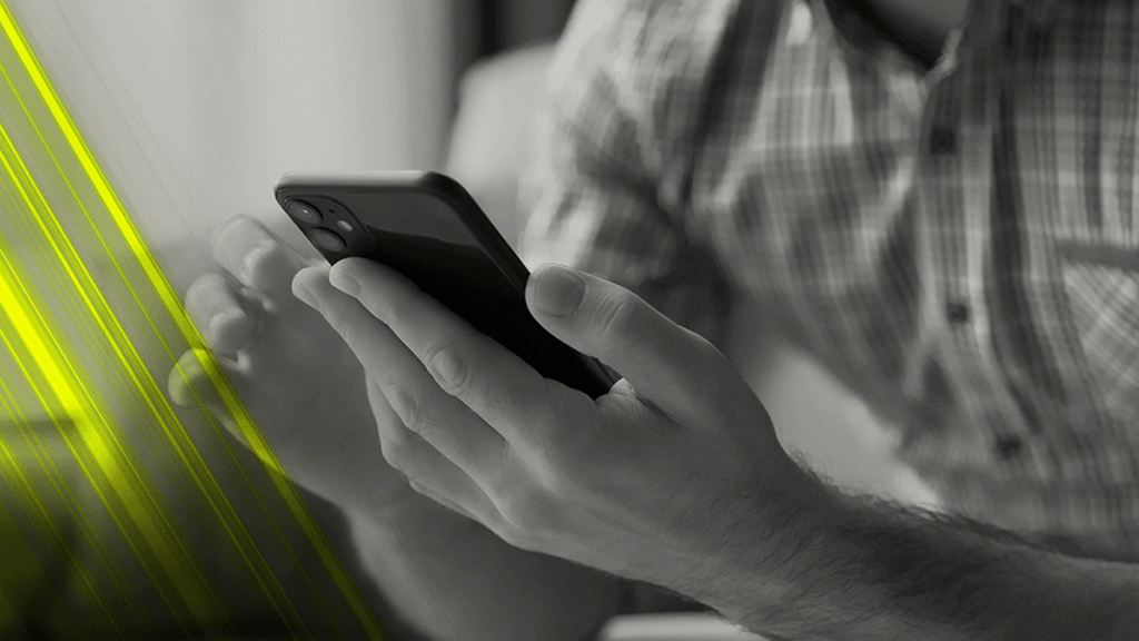 Man scrolling on a smartphone